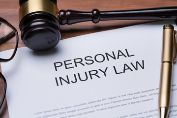 gavel and paper that says personal injury law