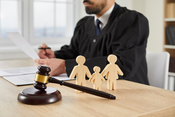 judge and gavel and fake wooden family