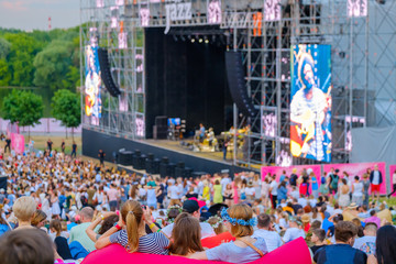 crowd and stage at concert music festival