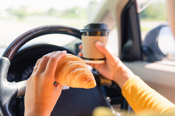 person eating while driving