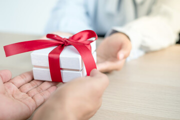 giving gift to someone