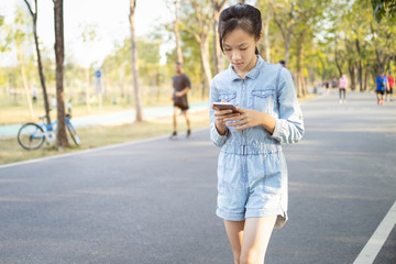 girl texting distracted while walking