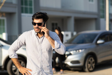 man on phone after car accident