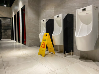 wet floor sign in hotel bathroom
