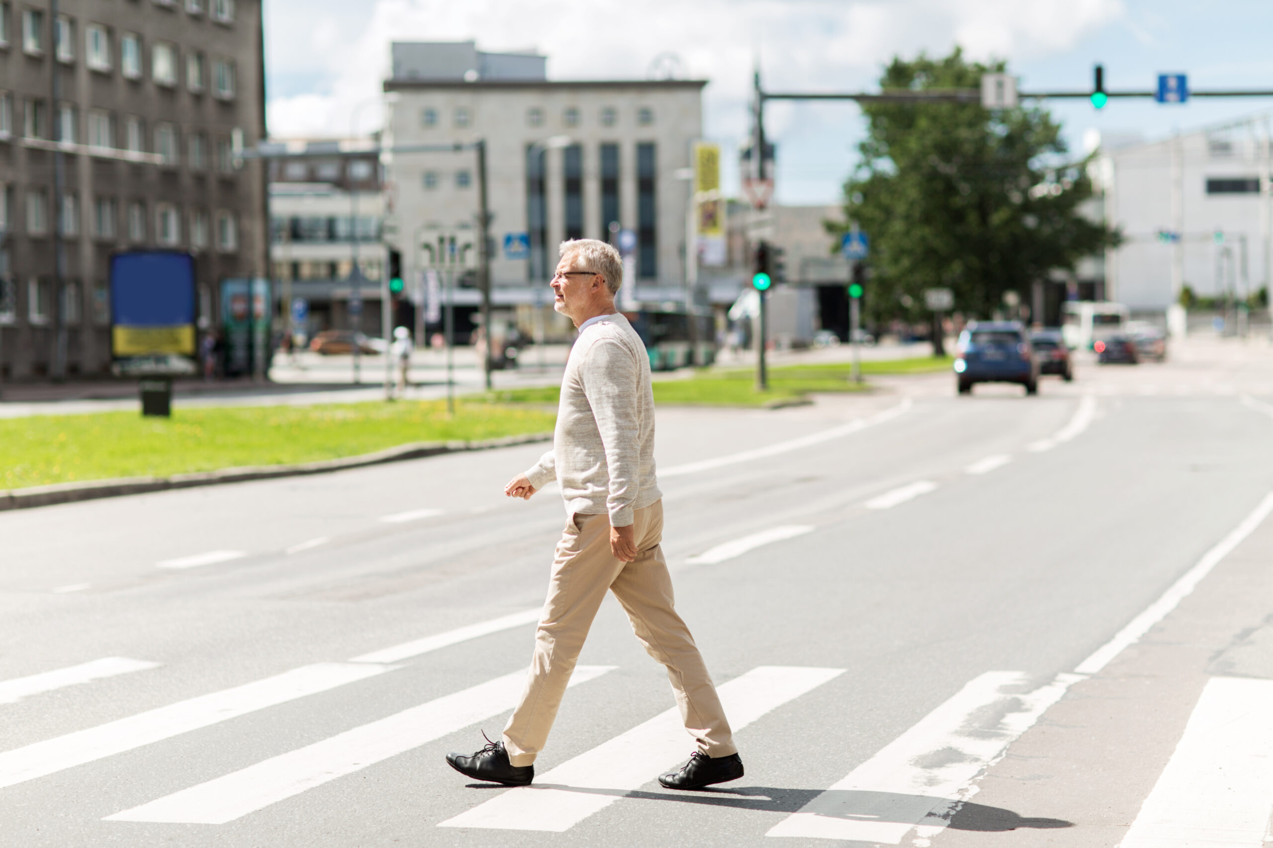 man crossing street